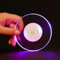 Macro detail of acrylic LED coaster showing clear circular design and colorful light - Round Colorful