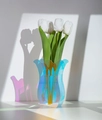 Iridescent wavy acrylic vase with white tulips casting colorful shadows on white background - Iridescent Without Flower 20cm Height
