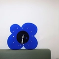 Modern translucent blue acrylic flower wall clock with minimalist white dial and hands - Blue 4-petal Clock
