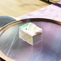 Modern iridescent acrylic tissue box holder with rainbow gradient effect for living room - Iridescent