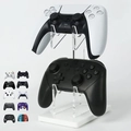 Dual-tier transparent acrylic game controller stand with a stable white base for desk storage - White