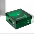 Detail of green acrylic storage box with lid and side handles for home organization - Small Green