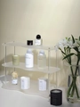 Drielaagse golvende acryl organizer plank met gouden accenten voor parfum en make-up - Volledig Gematteerd (Transparante Kolom)