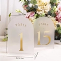 Detail of frosted arched acrylic wedding table numbers with gold foil lettering and base - Gold No. 1-15
