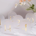 Frosted arched acrylic wedding table numbers with gold foil lettering on marble surface - Gold No. 1-10