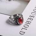 Vintage stainless steel ring with oval red gemstone and detailed scroll engraving - US 7 / Antique Silver