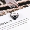 Anillo vintage de acero inoxidable con piedra arenisca azul y tallas florales finas - Talla US 6 / Azul