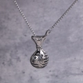 Close-up of retro silver money bag pendant with star detail on textured steel chain - Pendant + 70CM Chain