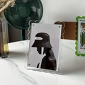 Modern 7-inch clear acrylic photo frame with wavy edges and magnetic screw accents - Clear