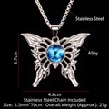Collana a farfalla gotica in acciaio inossidabile con occhio blu su sfondo nero lucido - Catena in acciaio / Blu (Occhio di Farfalla A)