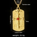 Golden cross necklace with red gemstone and floral relief on a rectangle pendant - Gold