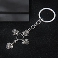 Gothic silver cross keychain with rose details and black heart gem on black background - Black Rhinestone Cross (101)
