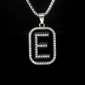 Silver letter E pendant necklace with black enamel and rhinestones on a box chain - Letter E