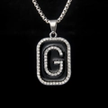 Silver bead chain necklace featuring a square pendant with black enamel and diamond letter G - Letter G