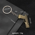 Portachiavi con pistola in lega di bronzo retrò e finitura metallica con trama - Modello Pistola P2020 (N. 44)