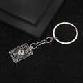 The Magician tarot metal keychain with black enamel dripping and silver finish - The Magician Tarot Keychain