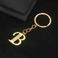 Golden alphabet letter B keychain with inlaid rhinestones and round keyring - Letter B Style / Gold