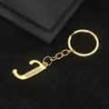 Golden keychain featuring letter J pendant with inlaid rhinestones on black background - Letter J Style / Gold