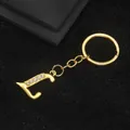 Golden letter L keychain with inlaid crystals and a polished metal finish - Letter L Style / Gold
