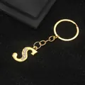 Golden keychain with letter S pendant featuring sparkling inlaid rhinestones - Letter S Style / Gold