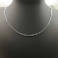 Polished 3mm stainless steel Cuban link chain necklace shown on a model against black background - 3mm*50cm / Silver