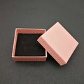 Pink textured square jewelry gift box with premium diamond pattern and black sponge lining - Pink