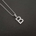 Detailed close-up of a silver letter B pendant encrusted with sparkling AAA cubic zirconia - B Pendant Only (Without Chain) / Steel