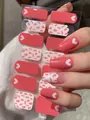 Close-up of pink heart pattern nail wraps showing diverse sweet designs on paper - Pink Foundation White Heart Irregular Spots Style (PDD-232)