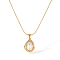 Elegant gold snake chain necklace with a vintage-style pearl drop pendant for women - Gold