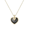 Détail d'un pendentif cœur en céramique avec incrustation noire et cristaux sur chaîne dorée - Ton Or Céramique Noire
