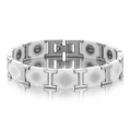 Dettaglio di piastrelle in ceramica bianca e bracciale per magnetoterapia in acciaio inox ad H - Bianco Argento