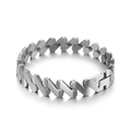 Detail of titanium steel magnetic bracelet featuring S-shaped links and matte finish - Female Style