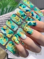 Detailed close-up of self-adhesive nail art stickers with watercolor marble floral patterns - Blue Green Yellow Watercolor Floral (DY-011)