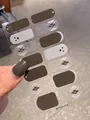 Details von dunkelgrauen Nagelstickern mit Rautenmuster, Glitzer und Geistermotiven - Rauten- und Punktmuster / Einzelblätter