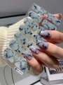 Detail of DY-012 self-adhesive nail stickers featuring blue marble texture and ink pattern - Light Blue Gray Black Cracked Marble (DY-012)