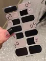 Detail of pink and black heart pattern nail stickers with glitter accents on a display card - Black Pink Contrast Heart French Style (PDD212)