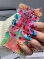 Detail of colorful ink marble pattern self-adhesive nail stickers on hands with model DY-014 - Colorful Ink Gradient Marble (DY-014)