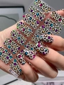 Macro shot of colorful marble leopard print nail stickers showing realistic hand application - Colorful Fashion Leopard Print (DY-017)