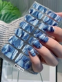 Detail of self-adhesive nail stickers with blue marble texture and gold glitter accents - Blue and White Gold Glitter Marble (DY-023)
