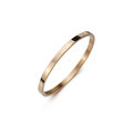 Detailed view of polished rose gold titanium steel oval bangle with side hinge closure - Rose Gold