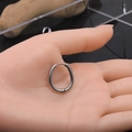 Orecchino a cerchio intrecciato Mobius argento a forma di U con finitura a specchio - Argento (Prezzo per pezzo)