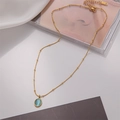 Élégant collier à perles plaqué or 18 carats avec pendentif ovale en œil de chat bleu - Or