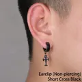 Close-up of black stainless steel cross clip-on earring worn on ear for non-pierced men - Floral Cross Clip (Non-Pierced) (Black)
