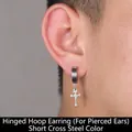 Close-up of a silver stainless steel cross pendant earring worn on a male model's ear lobe - Floral Cross Hoop (Pierced) (Steel Color)