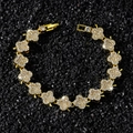Bracciale classico a fiori dorati con pavé di diamanti su sfondo in pietra nera - 21cm / Oro