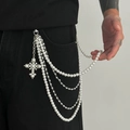 Detail of multi-layer hip hop trousers chain with white pearls and a cross pendant - Silver