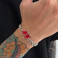 Close-up of hip-hop silver link chain bracelet with red enamel star pendants for men - Silver & Red