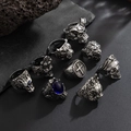 Detail of vintage punk rings featuring lion and wolf heads with antique silver finish - 9-Piece Set / Ancient Silver