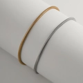 Detailed macro view of gold and silver herringbone chains on minimalist display stand - Mixed Colors Set (04649)