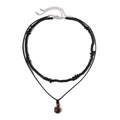 Detail of ethnic layered necklace featuring black beads and a red-brown stone pendant - Reddish Brown Natural Stone Necklace